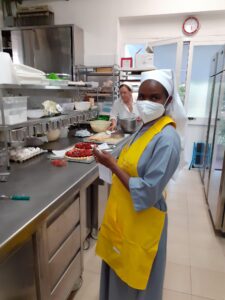 2022 hicsum 28 italia rwanda spazio spadoni misericordia stiava sr agnes formazione pane pizza 7 225x300