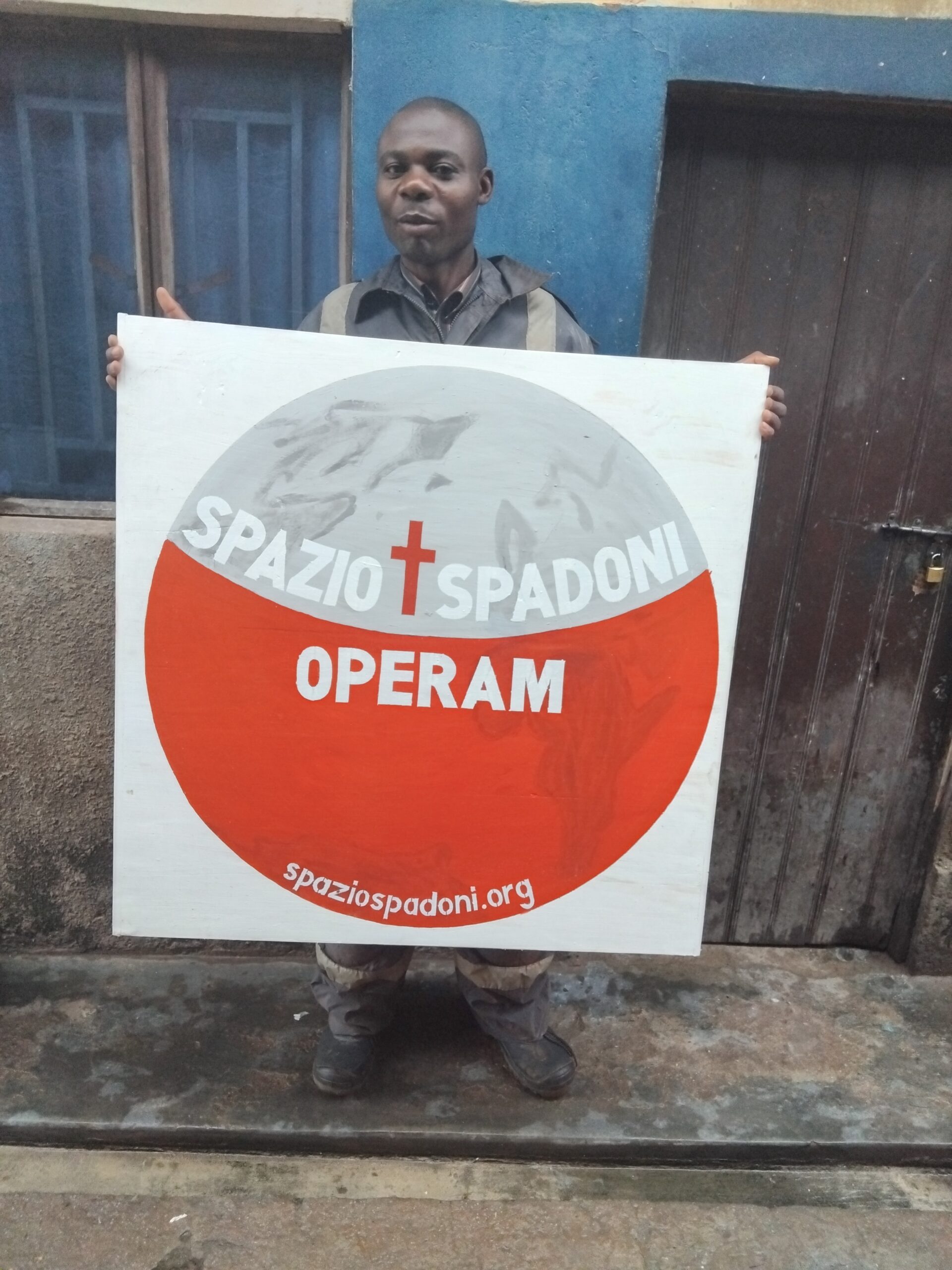 2026 avril 14 joint effort ouganda foulard plaque spazio + spadoni œuvres de miséricorde operam 2 scaled